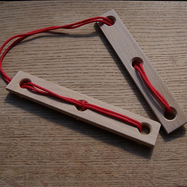 F&aring;ngens huvudkn&auml;ppare tr&auml; och sn&ouml;re