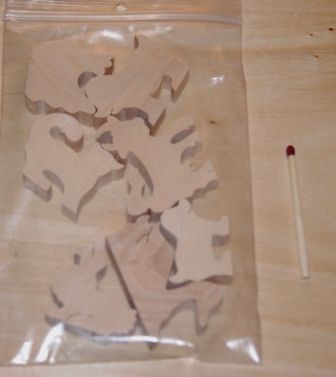 Påse med 7 träfigurer med gårdstema